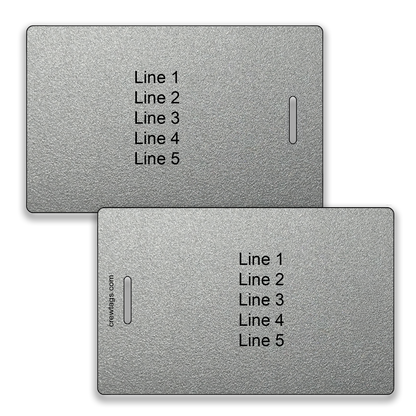 Two metallic silver luggage tags with black text for personalization showing placeholder lines labeled "Line 1" to "Line 5" and a vertical slot on each for attachment.